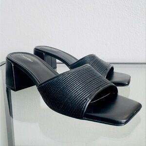 Calvin Klein
Women's Petunia Slip-On Dress Sandals